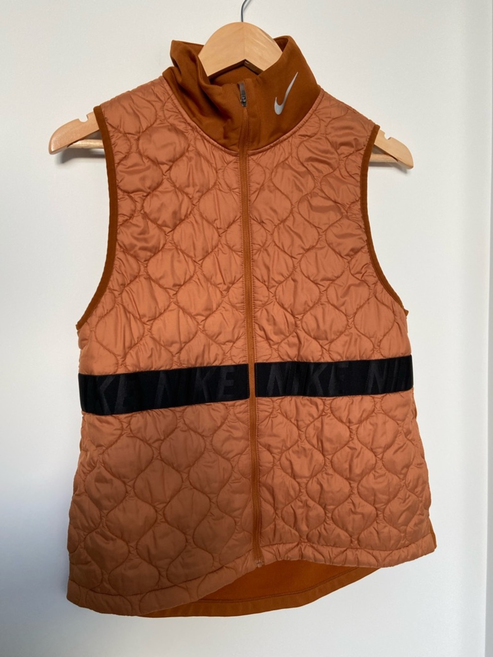 Nike Women’s Rust Orange Quilted Vest with Black Waist Band